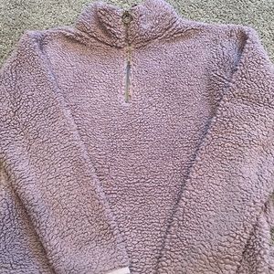 Lavender-purple, super soft sherpa that’s barley worn.